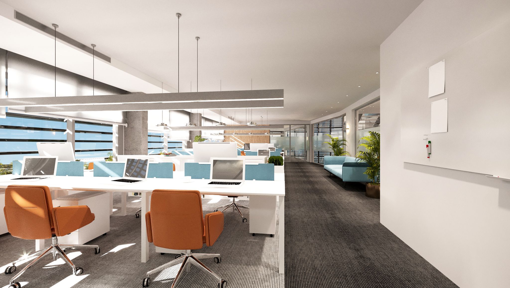 Modern koltuklar ve şeffaf bölmelerle ayrılmış, ferah ve geniş açık ofis çalışma alanı.