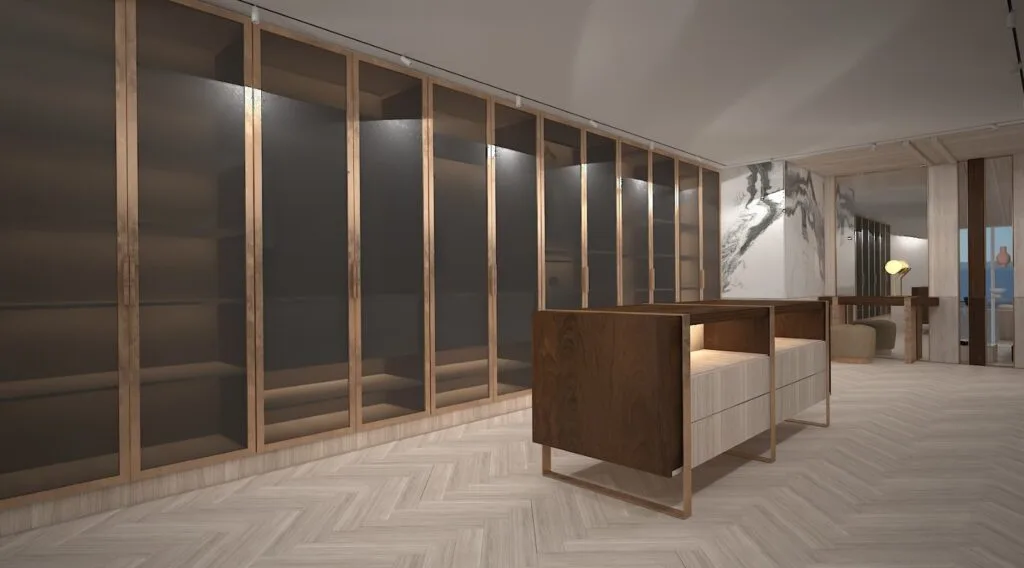 Modern Penthouse Tasarımı Ahşap zemin, cam kapaklı dolaplar ve modern aydınlatmalarla tasarlanmış lüks giyinme odası.