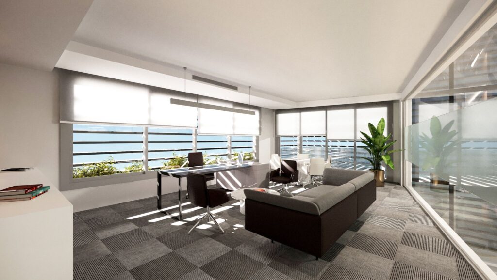 Modern Kurumsal Ofis Tasarımı Şehir manzarasına hakim, modern mobilyalar ve geniş pencereleriyle aydınlık bir yönetici ofisi.