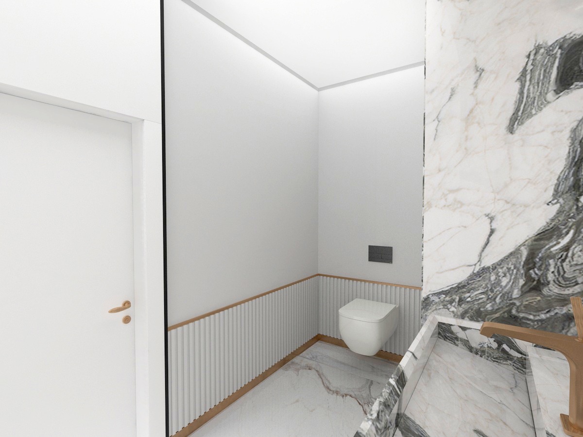 Mermer duvar paneli, yuvarlak hatlı lavabo ve beyaz seramiklerle minimalist bir banyo.