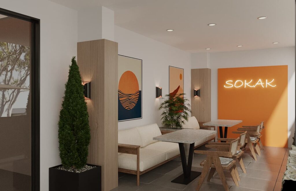 Kafe Restoran İç Mekan Tasarımı Turuncu duvar ve neon "SOKAK" yazısıyla tasarlanmış, dikkat çekici dış cephe oturma alanı renderı.