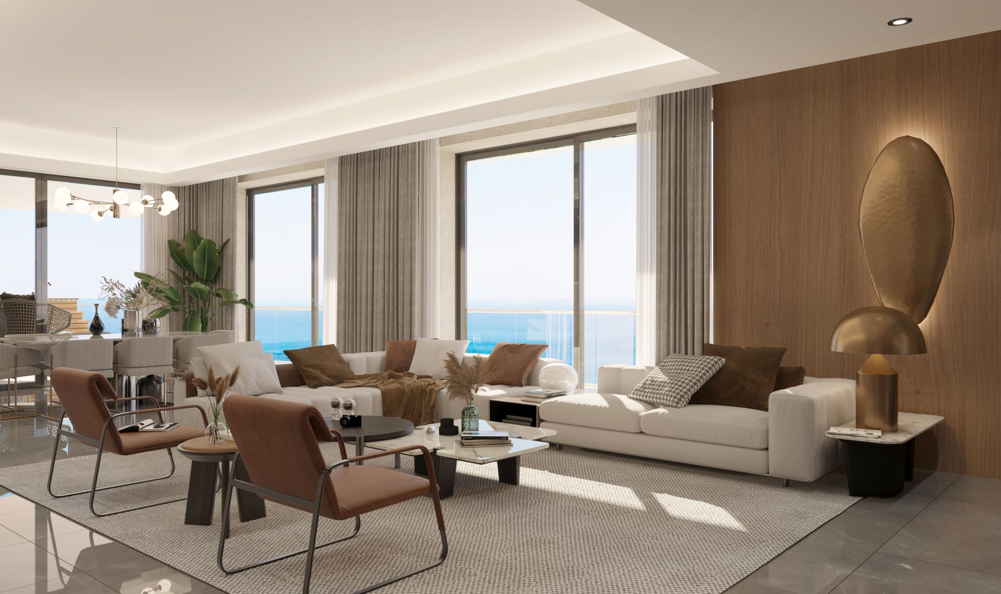 Geniş pencereleri ve modern mobilyalarıyla aydınlık ve ferah bir açık plan salon.