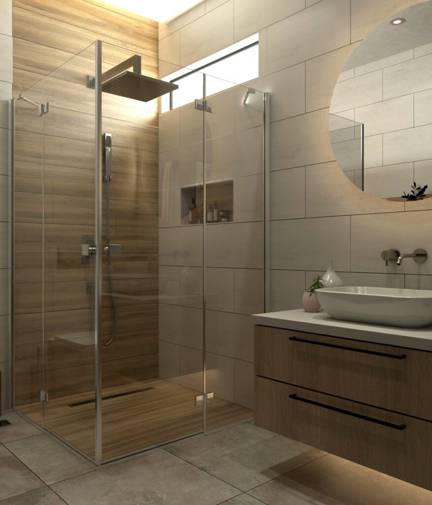 Ahşap ve açık renkli fayansların birleşimini gösteren, cam duşakabinli modern bir banyo.