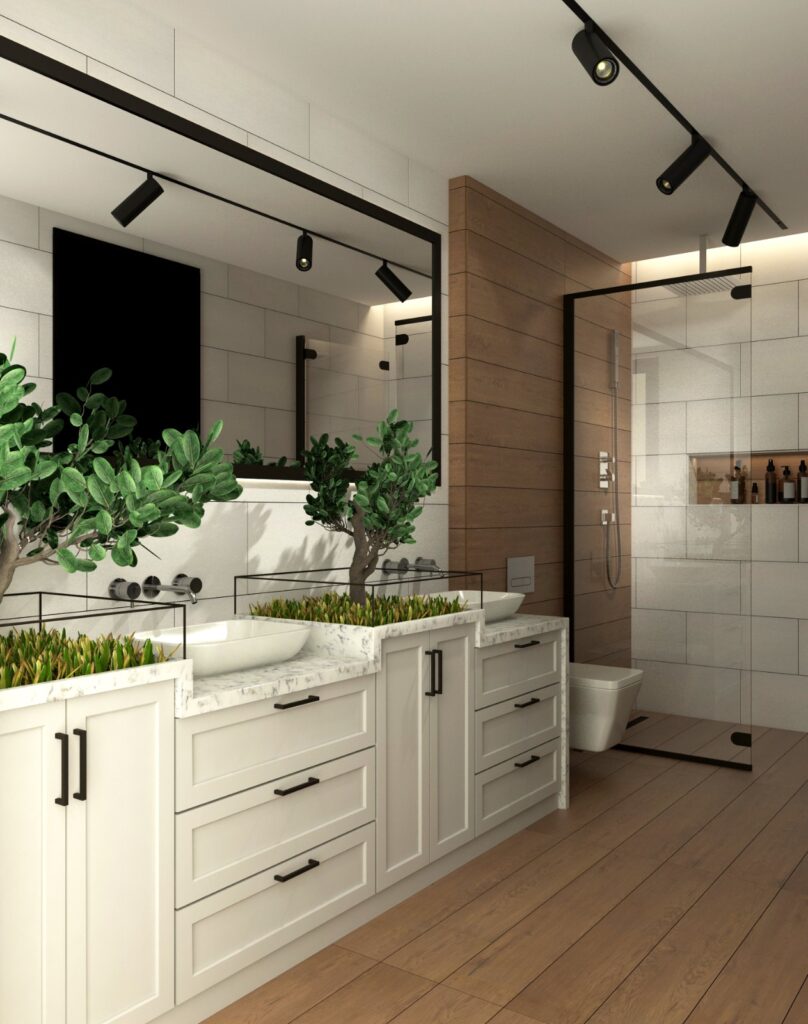 Aile Dostu Modern Villa Tasarımı Ahşap ve beyaz mermer lavabo, modern aydınlatmalar ve cam duşakabinle tasarlanmış lüks bir banyo.