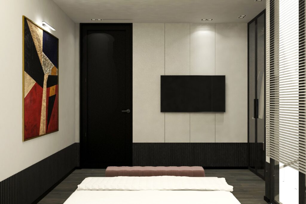 Yatağa bitişik, duvardan duvara uzanan modern gardırop ve minimalist TV ünitesiyle yatak odası.